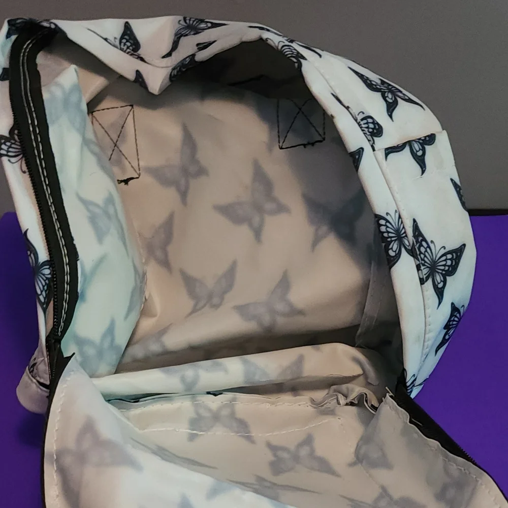 Black and white butterfly backpack